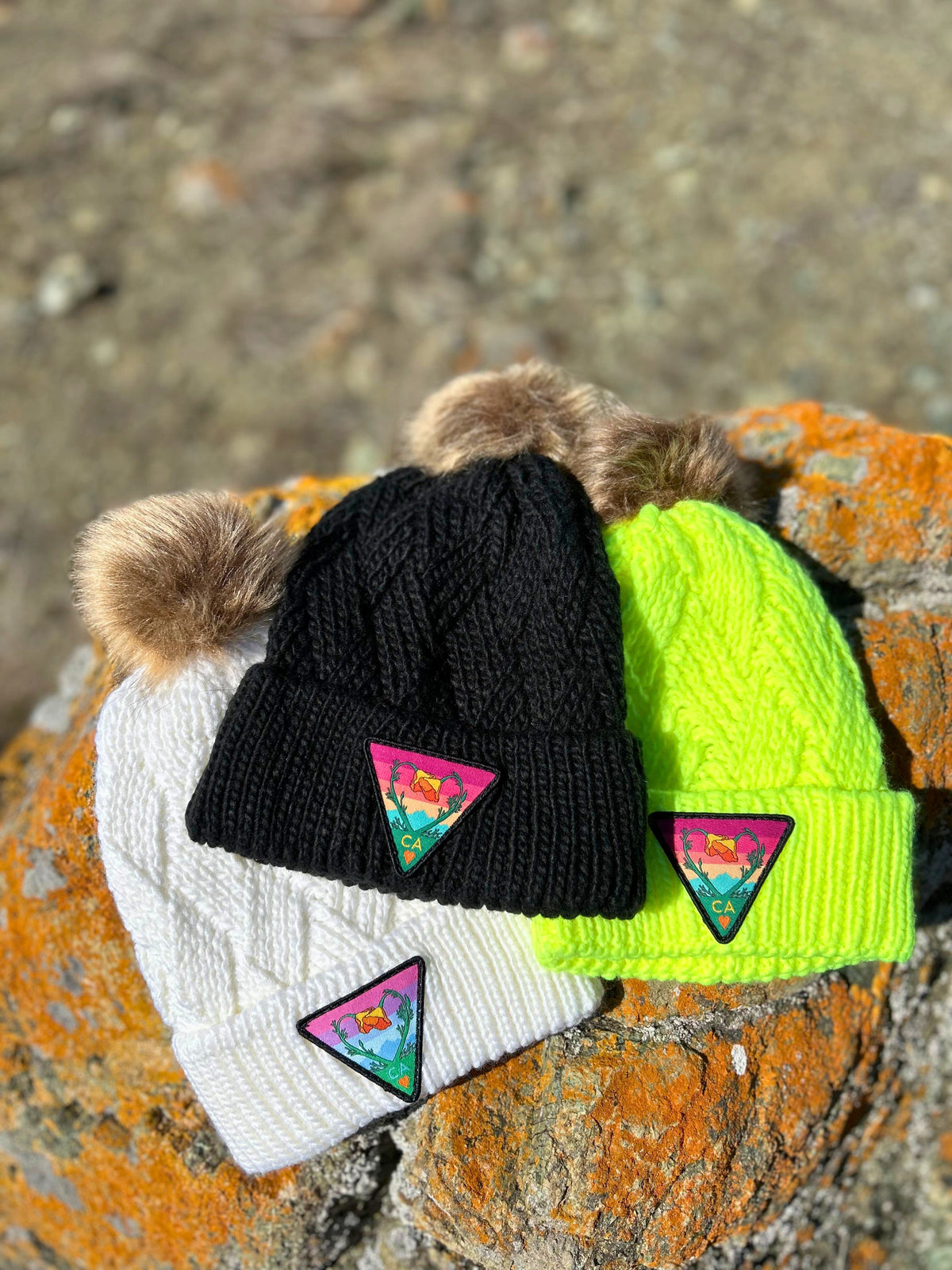 White Kooh Culture faux fur pom beanie with the Poppy CA Love patch, alternate view