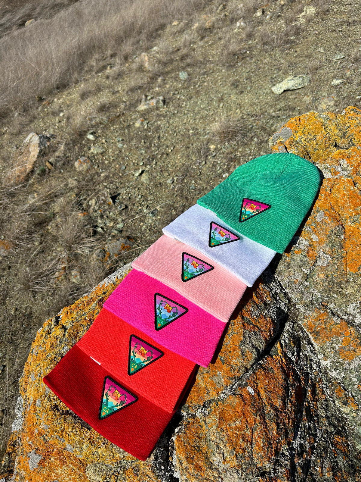 Heather green Kooh Culture cuffed beanie with the Poppy CA Love patch, alternate view