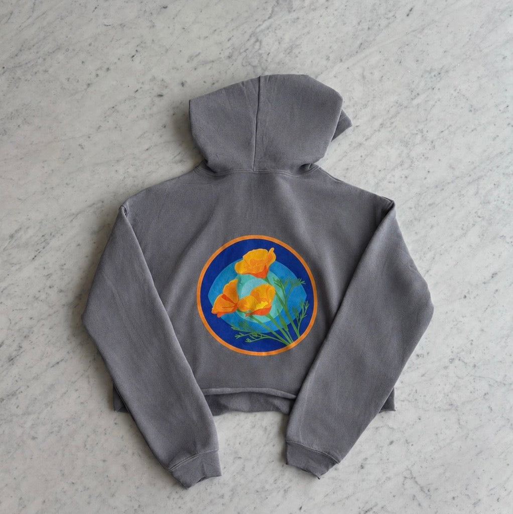 Back of the storm grey Kooh Culture women's cropped fleece hoodie, with the oversized Poppy Power graphic
