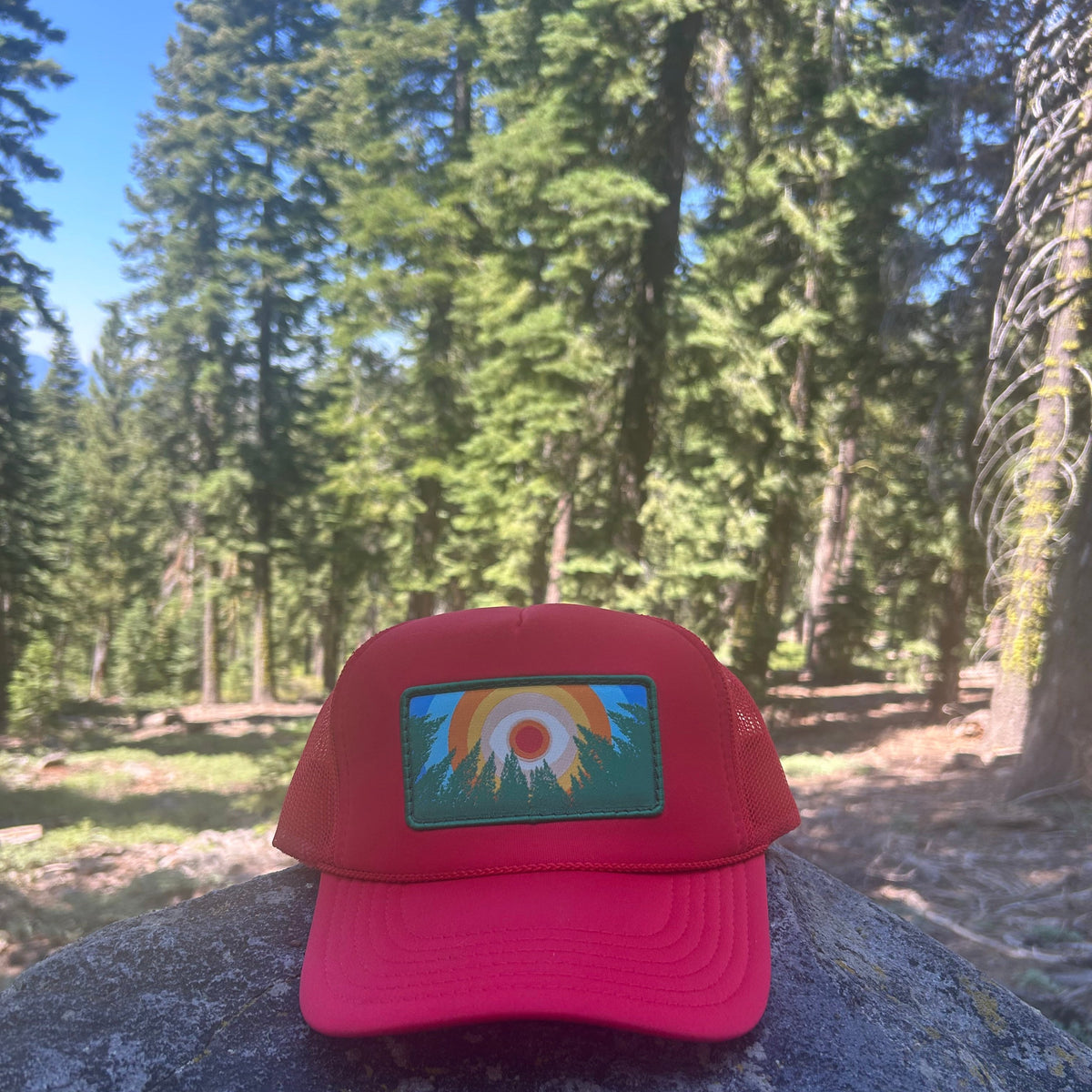 Red Kooh Culture foam trucker hat with the In the Trees XL patch