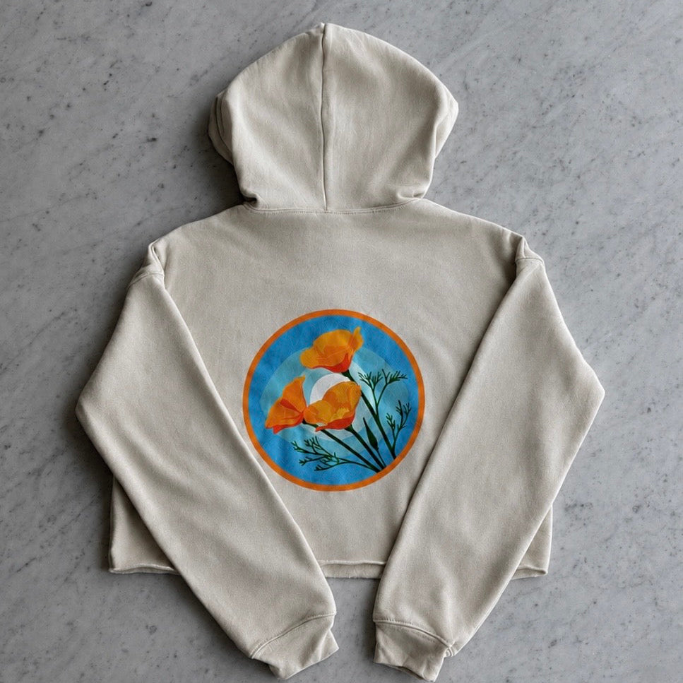 Back of the beige Kooh Culture women's cropped fleece hoodie, with the oversized Poppy Power graphic