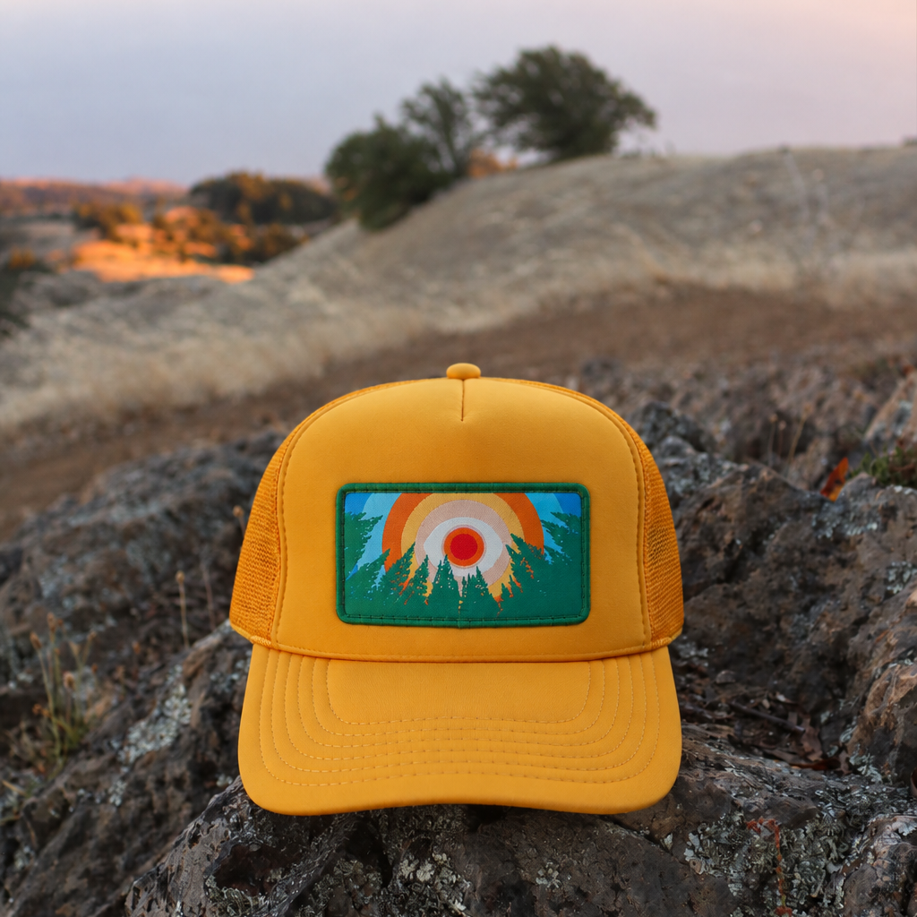 Gold Kooh Culture foam trucker hat with the In the Trees XL patch