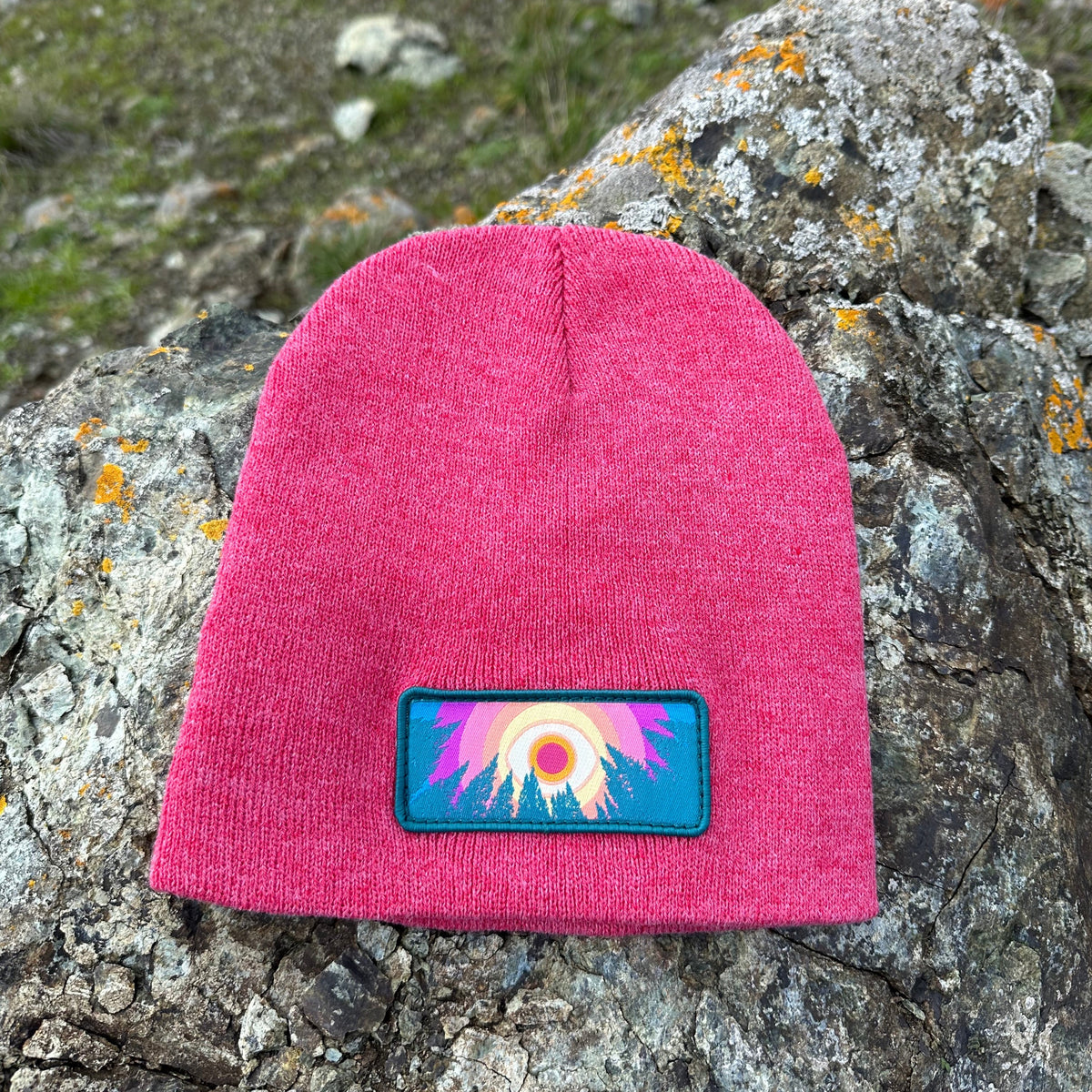 Heather red Kooh Culture cuffed beanie with the In the Trees patch