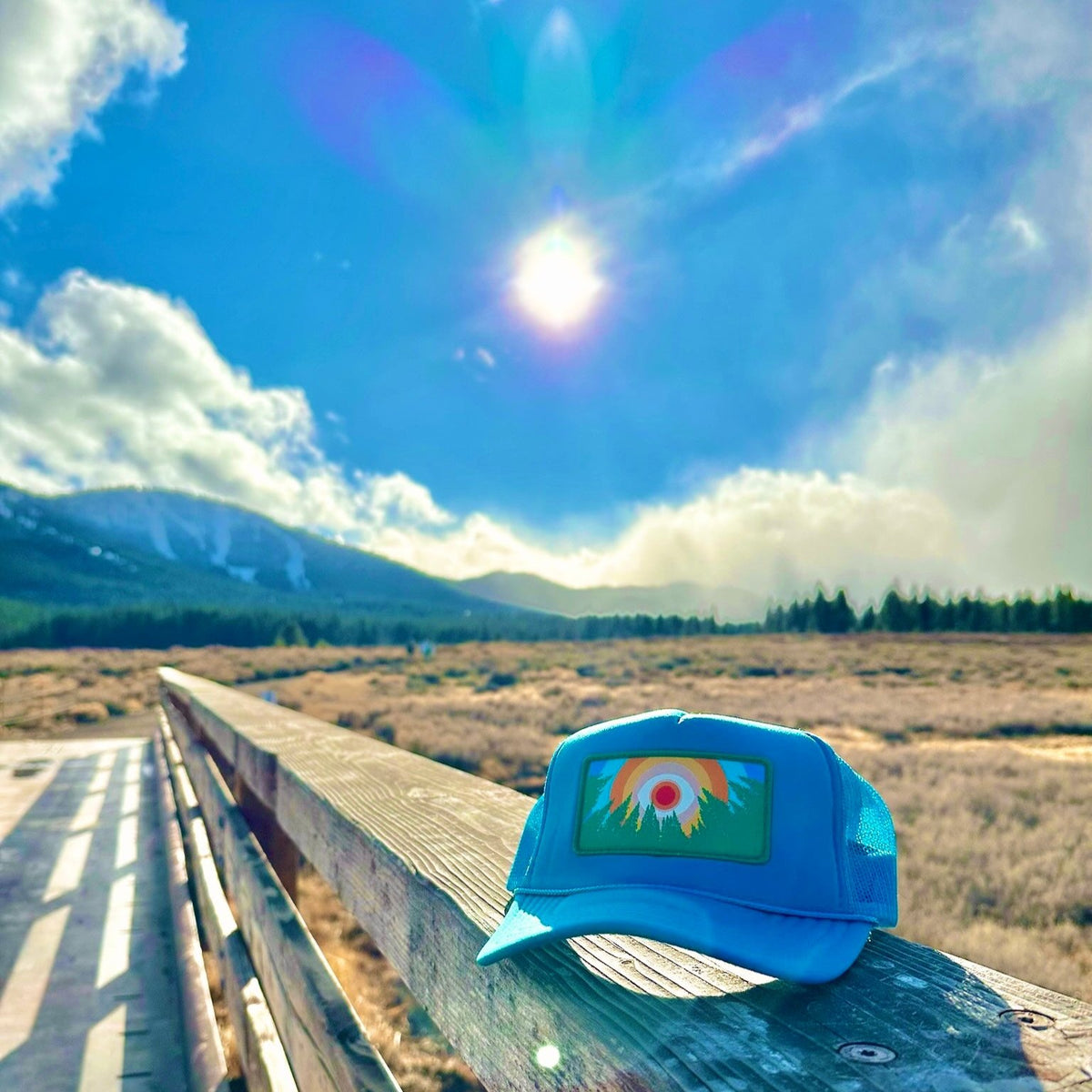 Turquoise Kooh Culture foam trucker hat with the In the Trees XL patch