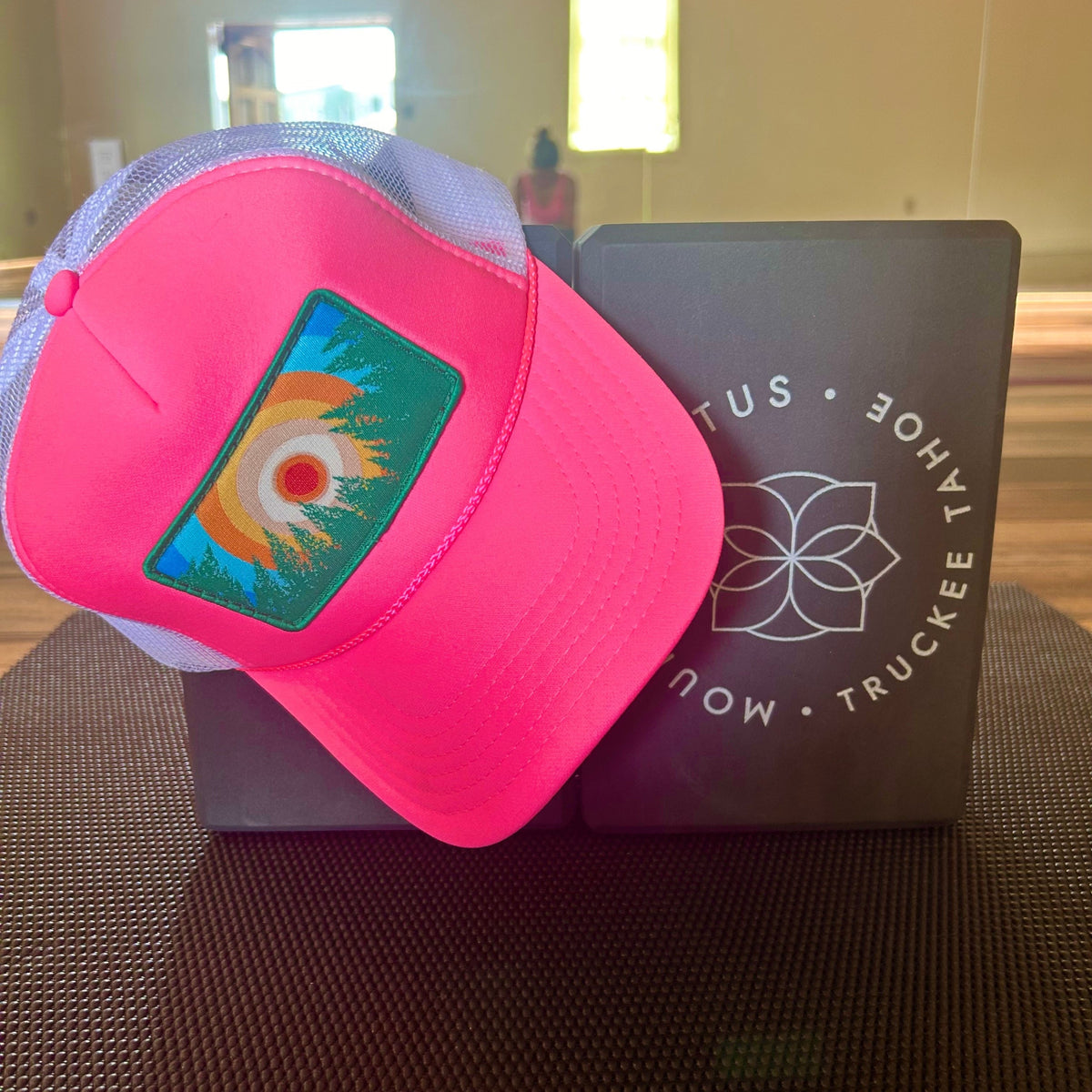 Pink and white Kooh Culture foam trucker hat with the In the Trees XL patch