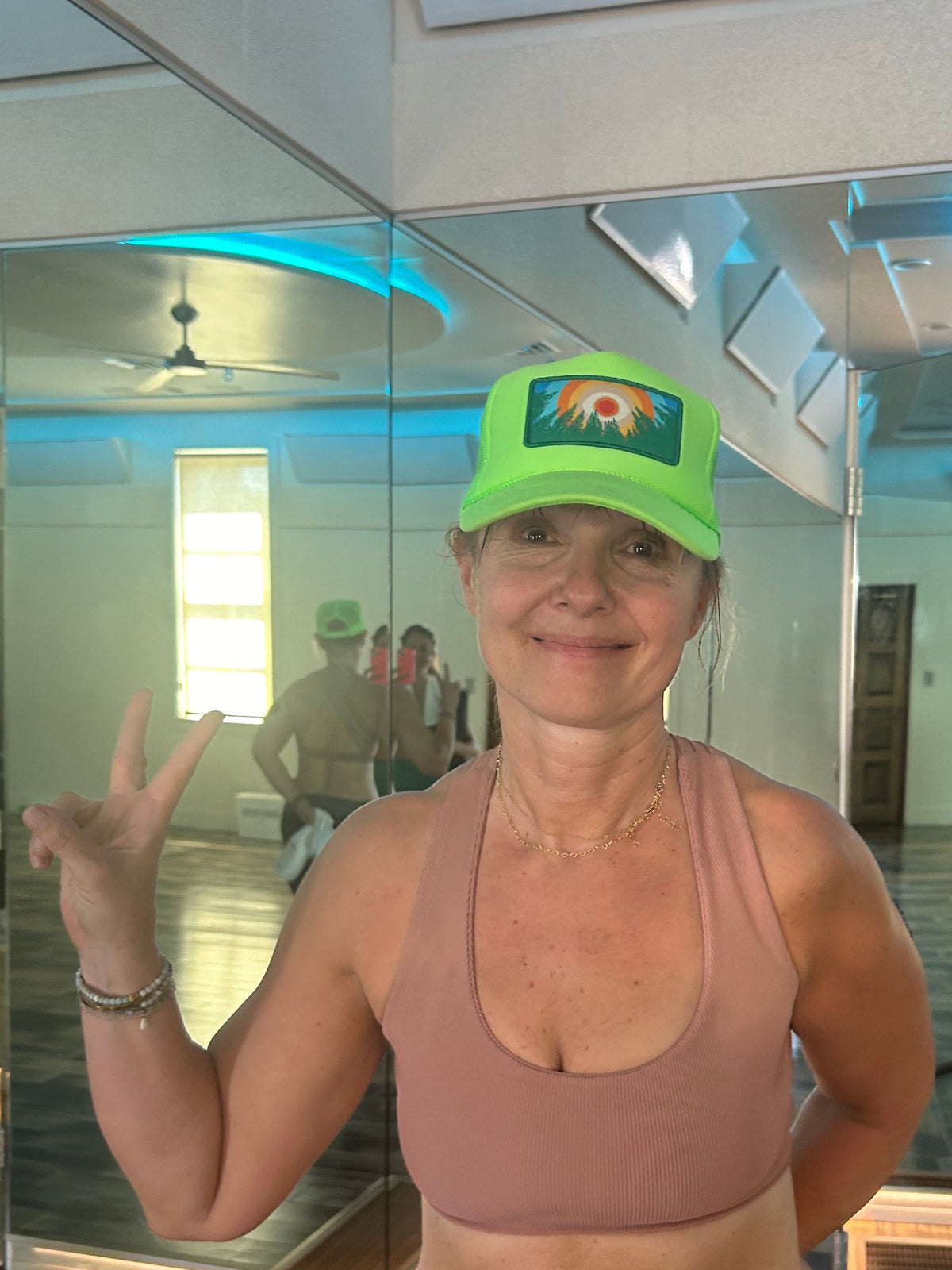 Neon green Kooh Culture foam trucker hat with the In the Trees XL patch, alternate view
