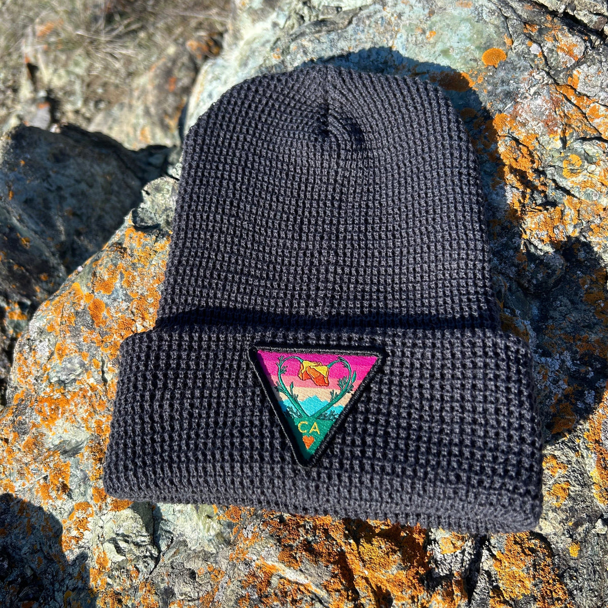 Gunmetal Kooh Culture waffle cuff beanie with the Poppy CA Love patch