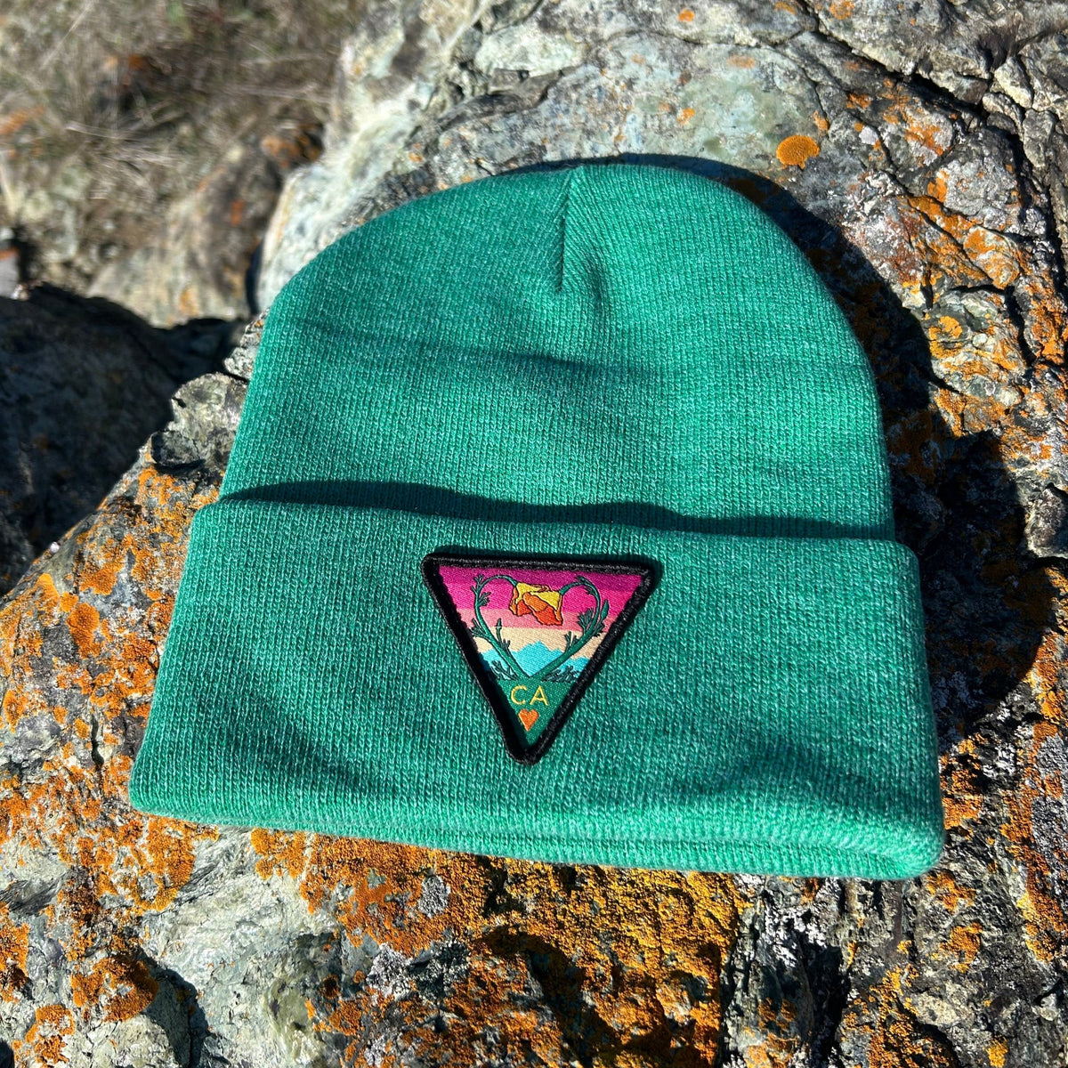Heather kelly green Kooh Culture cuffed beanie with the Poppy CA Love patch
