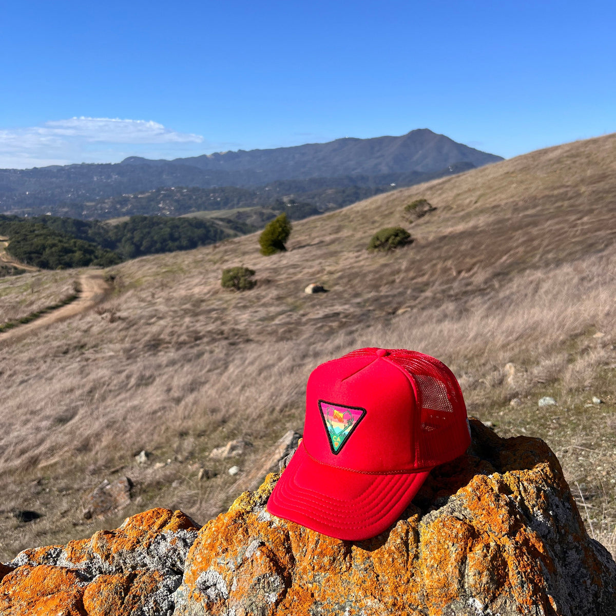 Red Kooh Culture foam trucker hat with the Poppy CA Love patch, alternate view