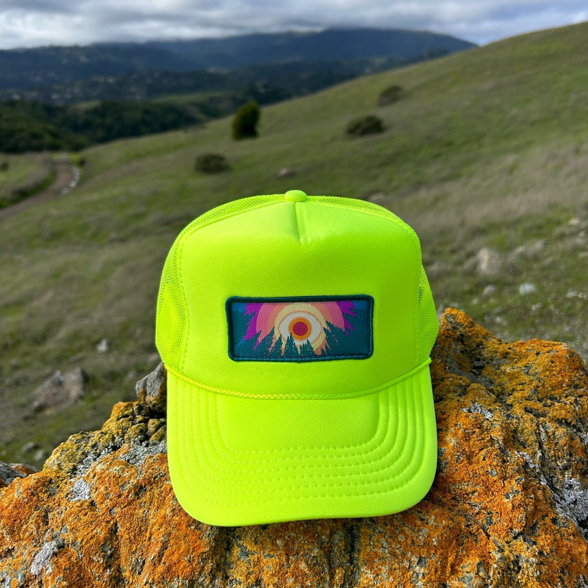 Neon yellow Kooh Culture foam trucker hat with the In the Trees patch