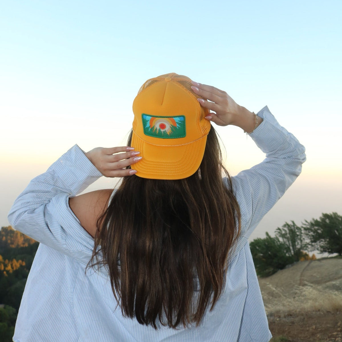 Gold Kooh Culture foam trucker hat with the In the Trees XL patch, alternate view