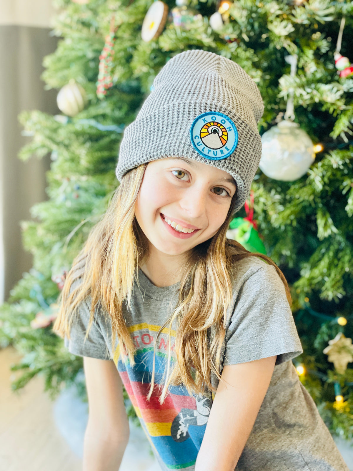 Heather grey Kooh Culture waffle cuff beanie with the mountain and sun badge, alternate view