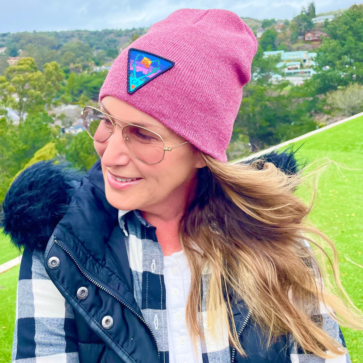 Heather burgundy Kooh Culture cuffed beanie with the Poppy CA Love patch in Night Mode colours